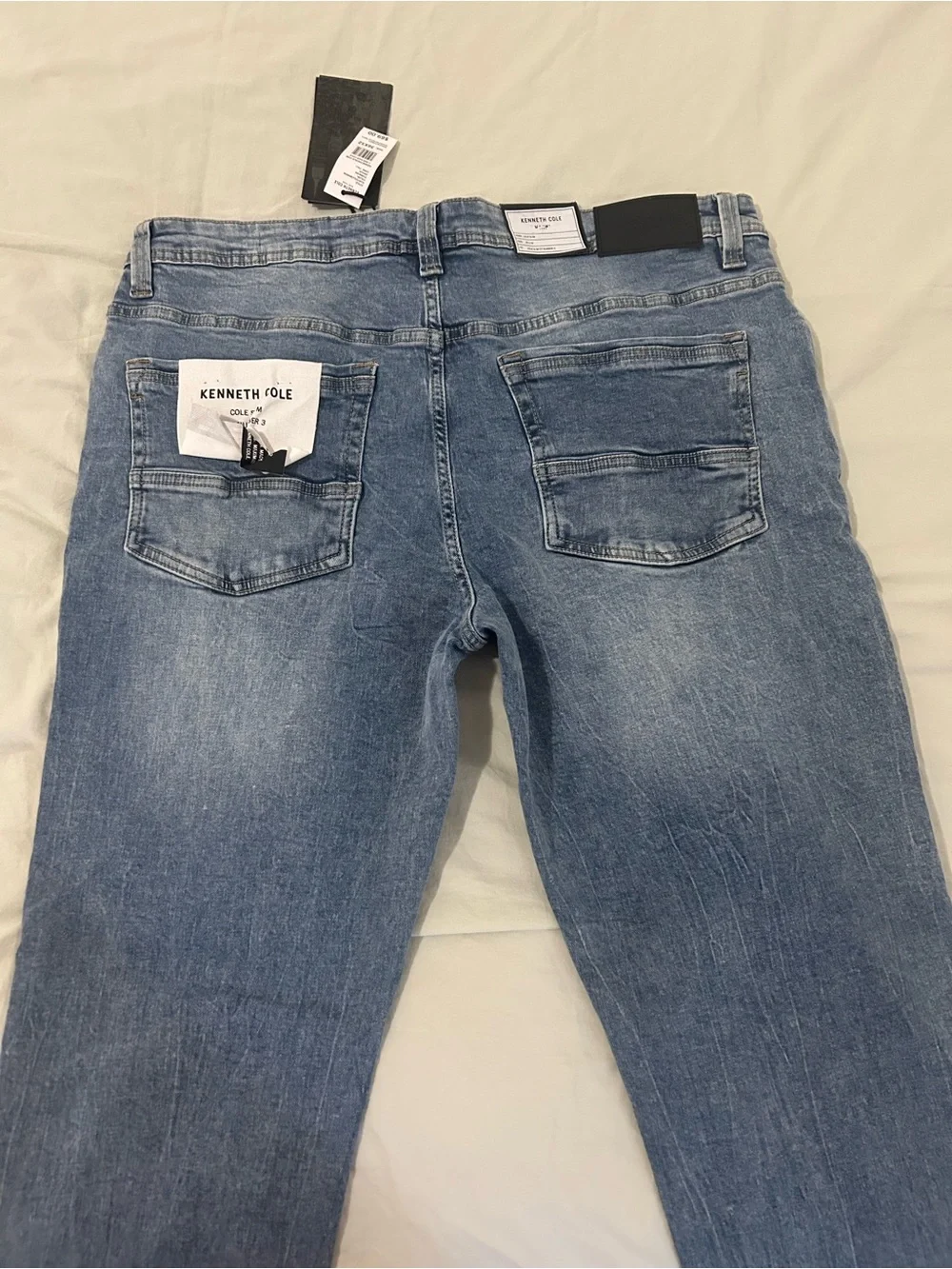 Kenneth Cole Men's Slim Straight Jeans in Faded Blue Wash